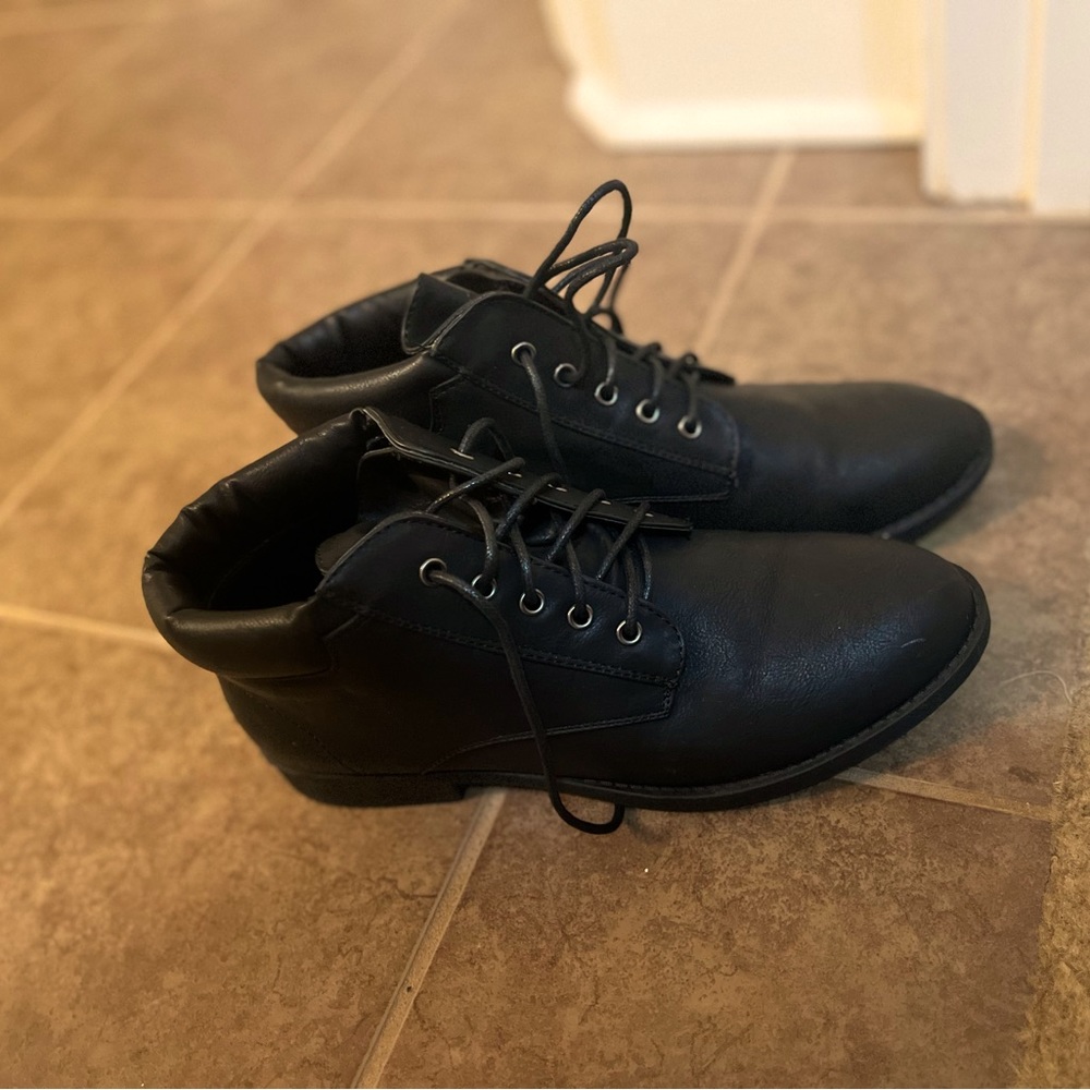 The cheetah print are a size 8, black boots are size 9